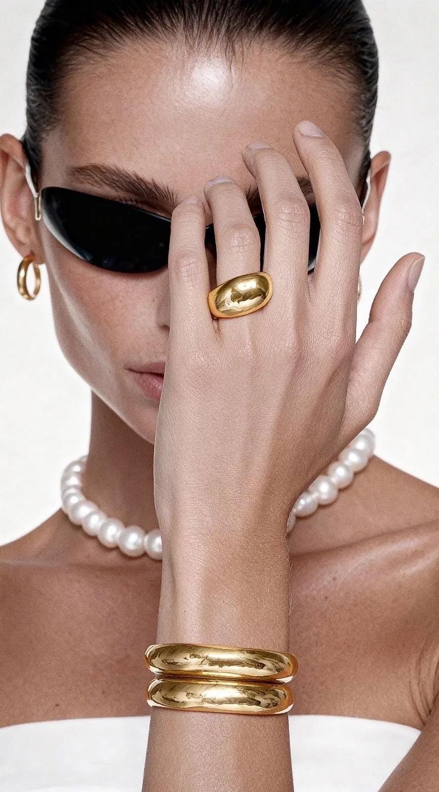 Kyoto collection campaign featuring stacked gold rings